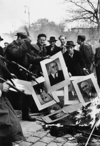 Civilians Burn Pictures of Party Secretary Matyas Rakosi, October 1956, © Photograph by Erich Lessing